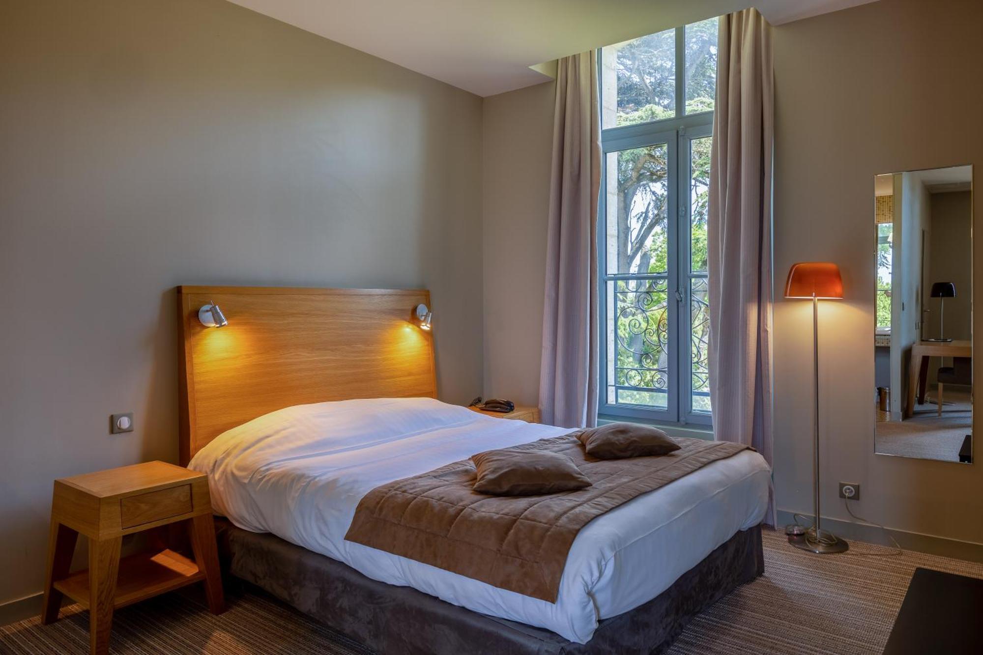 Hotel Et Spa Du Chateau Lagord Zimmer foto